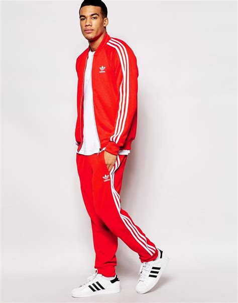 red adidas original track suits